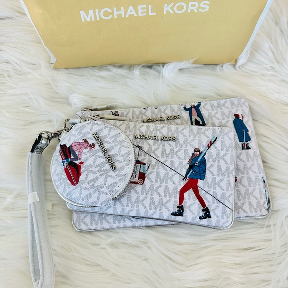 NWT Michael Kors Ski Print Jet Set Girl's Trio
Wristlet Set - Picture 2 of 4